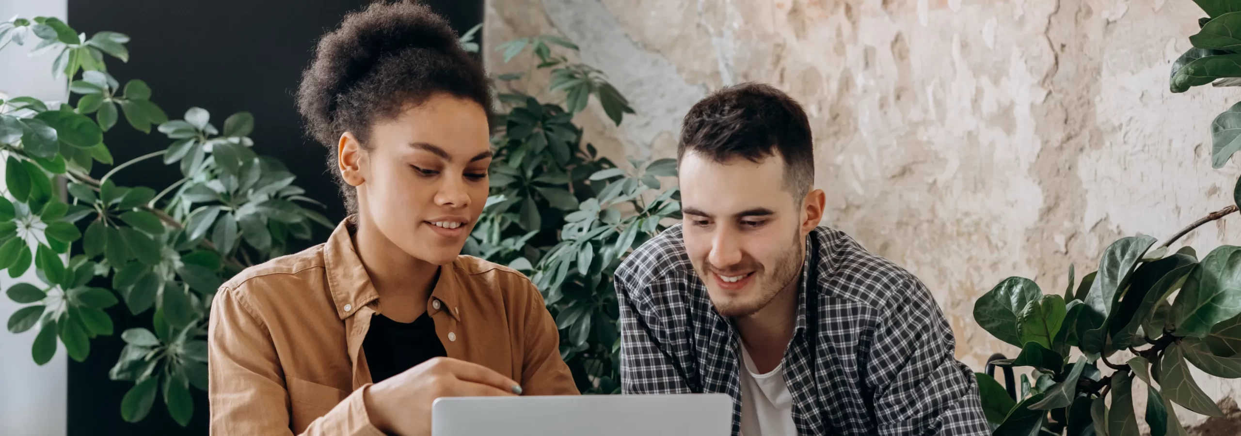 Man-and-woman-on-laptop